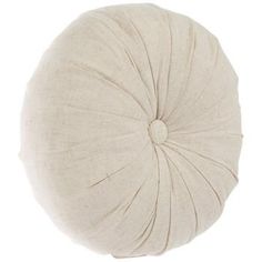 a white round pillow on a white background