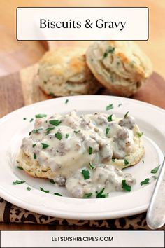 biscuits and gravy on a plate with bread