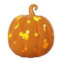 an orange pumpkin with yellow stars on it