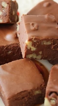 chocolate and nuts are stacked on top of each other in this close - up photo