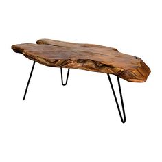 a wooden table with black hairpin legs and a large slab of wood on top