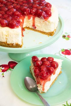 a piece of cheesecake with cherries on top