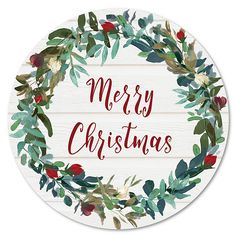 a merry christmas wreath with red berries and greenery on white wood planks is the center piece of this round sign