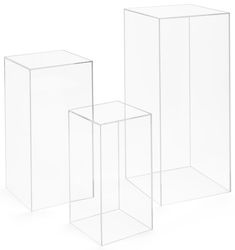 three clear boxes sitting next to each other