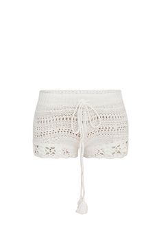 Introducing the Nevi Short. Designed with a cotton, crochet knit fabric, these shorts debut with sweet pointelle detailing with dimensional crochet flowers. The bottoms feature a ribbed double crochet edging at the waistband with a tassel drawcord at center front. *Shorts do not include the USA patches as seen on Suni Lee.