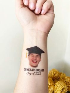 a person with a graduation cap on their wrist and the words congrats lucasi class of 2012