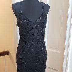 Black Gorgeous Long Beaded Gown. Still Has Tags On It. Fits Much Smaller. Black Evening Dress With Beaded Straps, Glamorous Beaded Evening Dress For Night Out, Beaded Evening Dress For Night Out, Beaded Floor-length Dress For Night Out, Black Beaded Evening Dress For Night Out, Sleeveless Beaded Sequin Dress For Evening, Beaded Black Evening Dress For Night Out, Black Beaded Dress For Prom, Beaded Black Dress For Prom