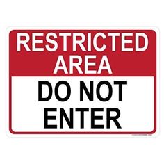 a red and white sign that says restricted area do not enter