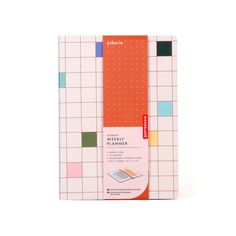 a note book with an orange and pink cover