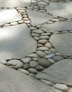 the rocks are arranged in a circle on the ground, and they look like they have been made out of stones