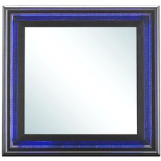 a black and blue framed mirror with lights on it's sides, in front of a white background