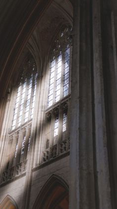 sunlight streaming through the windows in an old cathedral