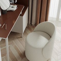 a white chair sitting on top of a wooden desk next to a mirror and lamp