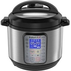 an electric pressure cooker with thermometer on it's side and red light