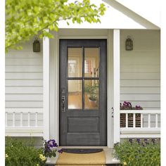 the front door of a white house with a sign on it that reads 5410