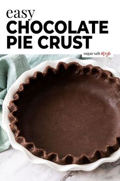 an easy chocolate pie crust is ready to be baked in the oven and served on a plate