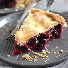 a piece of pie on a plate with a fork