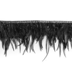 One of the hottest pieces to fly into Mood's collections of top-notch trims is this 6" Black Cock Feather Fringe. We are not exaggerating when we tell you how soft this trim is. Attached to a smooth, lustrous selvage, this is the perfect trim to add glam to the most basic of dresses. Layer these beautiful feather fringes onto a gorgeous flare dress, or even go as far as using this trim with tulle to put your own twist on a tutu. These astonishing fringed feathers will have your imagination and c Raven Feather, Feather Lamp, Feather Fringe, Feather Decor, Feather Wings, Mood Fabrics, Feather Trim, Goose Feathers, Black Fringe