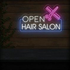 an open hair salon neon sign on a wooden wall