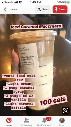 someone is holding up a cup of iced caramel macchiato for $ 100