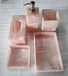 pink marble bathroom accessories set with soap dispenser, toothbrush holder and soap dish