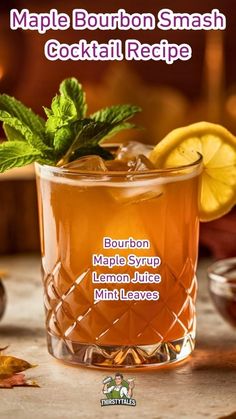 the maple bourbon smash cocktail recipe is ready to be served with lemon and mint leaves