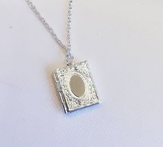 A cute bookish locket necklace which you can attach dear photos or secret notes in.  Choose between gold, bronze, rose gold, black metal and silver coloured metal. Book Locket Necklace, Secret Notes, Book Locket, Gold Book, Locket Necklace, Gold Black, Black Metal, Locket, Or Rose