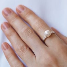 Diamond and pearl ring in white gold | KLENOTA Simple Pearl Engagement Ring, Pearl Rings In Gold For Women, Pearl Diamond Ring Engagement, Diamond And Pearl Engagement Ring, Pearl Wedding Ring Set, Pearl Wedding Rings, Big Pearl Ring, White Gold Pearl Ring, Diamond And Pearl Ring