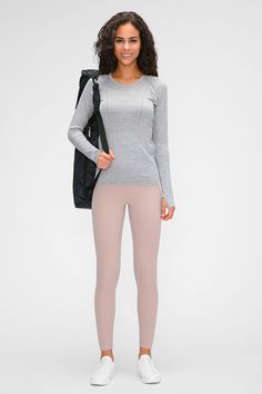 Size: Tight fit Pattern: Plain Feature: Long sleeve. pullovers Neckline: Crewneck Sheer: No Stretch: Stretchy Measurements: Size 4: length 22 in. sleeve 26 in. waist 26 inSize 6: length 23 in. sleeve 27 in. waist 29 inSize 8: length 24 in. sleeve 28 in. waist 31 in Material composition: 80% nylon. 20% spandex Care: Machine wash cold. Tumble dry low. Imported Shipping time: 5-10 business days Gray Crew Neck Activewear For Light Exercise, Fitted Gray Crew Neck Activewear, Gray Fitted Crew Neck Activewear, Fall Stretch Long Sleeve Athleisure Top, Fall Stretch Long Sleeve Top In Athleisure Style, Athleisure Stretch Long Sleeve Crew Neck Top, Stretch Crew Neck Long Sleeve Top Athleisure, Stretch Long Sleeve Crew Neck Top For Athleisure, Solid Crew Neck Long Sleeve Top In Athleisure Style