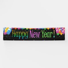 a happy new year banner with balloons and confetti