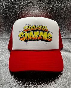 Subway surfers trucker hat. **no refunds/exchange** (if you are looking to get this hat for halloween i would recommend the priority shipping option) Subway Surfers Hat, Subway Surfers Spray Can, Surfer Costume, Subway Surfer, Red Trucker Hat, Subway Surf, Funny Trucker Hat, Subway Surfers, Pretty Halloween Costumes