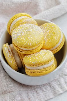 I've been looking for some fun cake macarons to make my sister for her birthday. We just tried this gooey butter cake macaron filling and it's amazing! It tastes like a combination of yellow cake and cream cheese. I love decorating the French macaron shells with some confectioners' sugar so they look pretty. I'm really excited to make these again! Yellow Macarons, Macaroons Cake, Cake Macarons, Gooey Butter, Gooey Butter Cake, Lemon Bundt Cake