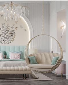 a living room filled with furniture and a chandelier hanging over the couches