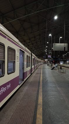 the train is stopped at the station waiting for passengers