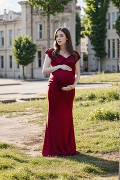 Beautifully Designed Pregnancy Dress with Leaf Embellishments and Flowing Train Elegant Maternity Maxi Dress With Short Sleeves, Elegant Short Sleeve Maternity Maxi Dress, Fitted Floor-length Maternity Dress For Prom, Red Maxi Maternity Dress, Elegant Floor-length Maxi Dress For Maternity, Elegant Floor-length Maternity Gown, Red Floor-length Maternity Dress, Fitted Red Maternity Dress, Elegant Maternity Maxi Gown