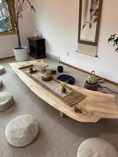 a large wooden table sitting on top of a carpeted floor