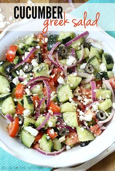 cucumber greek salad in a white bowl