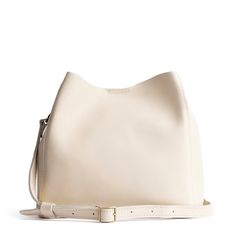 Bone | symmetrical bucket bag with latch closure and removable crossbody strap Portland Leather Goods, Butterfly Bags, Purse Organizer, Leather Tote Purse, Canvas Purse, Utility Bag, Leather Stand, Handbags Women, Mens Leather Bag