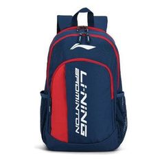 a blue and red backpack with white writing on the front, two zippers at the bottom