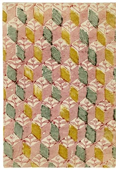 a pink and green rug with squares on it's sides, in different colors