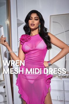 a woman in a pink dress posing with her hands on her hips and the words, wren mesh middress