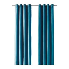 two blue curtains hanging on the side of a window