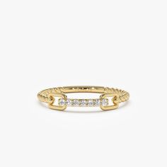 a gold ring with diamonds on it