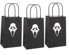 three black shopping bags with white ghost faces on them