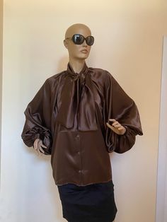 "This is a very stylish Womens Silk blouse. It is comfortable and cozy. Made for a free flowing fit. Great for all year around and for any special occasion or casual day can be dressed up or dressed down. SIZE CHART SIZE S - US 6, UK 8, EU 36 bust: bust around 34.5\"/90cm Waist: waist around 27.5\"/70cm Hips: hips around 34.5\"/90cm SIZE M - US 8, UK 10, EU 38 bust: bust around 37.5\"/95cm Waist: waist around 29.5\"/75cm Hips: hips around 37.5\"/95cm SIZE L - US 10, UK 12, EU 40 bust: bust aroun Brown Long Sleeve Party Tops, Brown Evening Blouse For Fall, Fall Solid Silk Tops, Brown Silk Blouse For Work, Brown Long Sleeve Party Blouse, Brown Silk Long Sleeve Tops, Brown Long Sleeve Blouse For Party, Brown Silk Party Tops, Chic Brown Silk Top