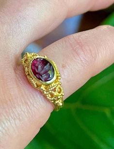 this vintage/antique ring is crafted in byzantine style in solid high purity yellow gold of approx 20-24k. unmarked but fully tested. items which are made before 1920 are not always hallmarked - antique old items often have no markings.  it is bezel set with carved garnet - intaglio- the carving is a creature with wings and reminds of a Bird or a Dragon.  weight approx 4.37g size approx 5.9 near 6 USA please see photo.  in fabulous condition -  solid and well made.  fast free insured priority sh Victorian Gold Signet Ring With Gemstone, Antique Engraved Gold Ring With Gemstone, Antique Gold Engraved Ring With Gemstone, Vintage Gold Carved Ring, Victorian Yellow Gold Carved Rings, Victorian Carved Yellow Gold Rings, Victorian Yellow Gold Ruby Ring With Intricate Design, Victorian Ruby Ring In Yellow Gold With Intricate Design, Victorian Style Gold Engraved Ring With Intaglio