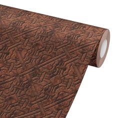 a brown tie with intricate designs on it