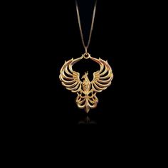 Embrace the transformative power of the legendary Phoenix pendant. Crafted with intricate detail, this gold masterpiece symbolizes rebirth and resilience. Feel the fiery spirit of Phoenix, representing strength and renewal. PENDANT INFORMATIONThis pendant is made of real, solid gold.• Made in USA• Material: 14k or 18k solid gold• Finish: polished• Height: 1.25" (32 mm) x Width: 1" (27 mm)• Pendant weight: approx. 6 grams (14k)• Bail: fits up to 4 mm chains• Solid back, not hollow• A certificate