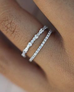 a woman's hand with a ring on it and the words good stone inc written in