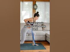 a woman is using a yoga mat with a blue pole in front of her and the caption reads, circuit pishaa workout with a loop band